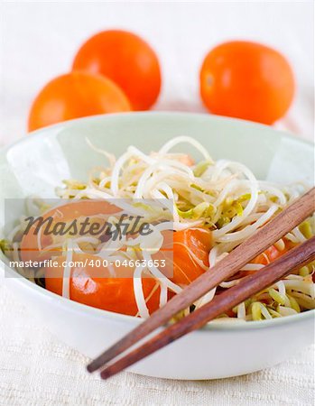 Cooked organic bean sprouts with tomatoes.