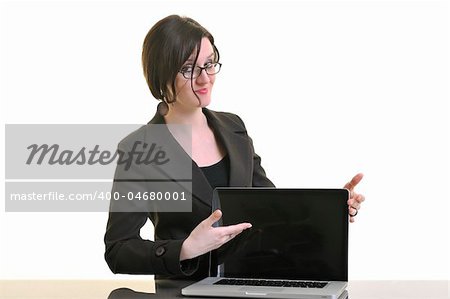 one young business woman isolated on white working on laptop computer