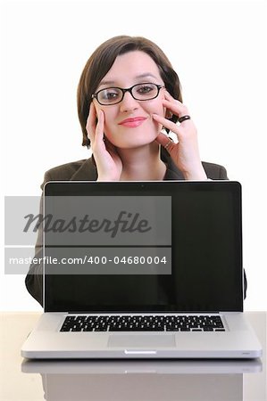 one young business woman isolated on white working on laptop computer