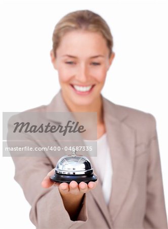 Attractive businesswoman holding a service bell against a white background