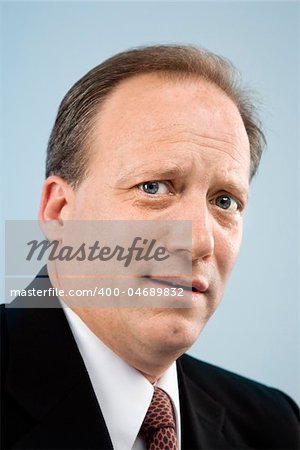 Portrait of Caucasian middle aged businessman.