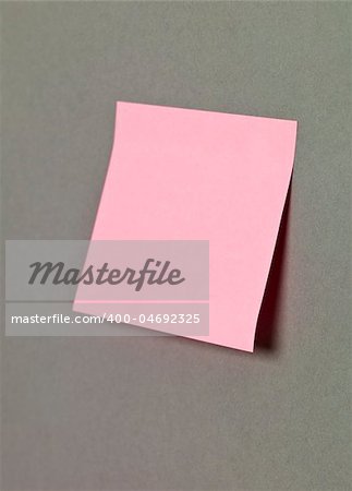 Pink Adhesive Note on grey background