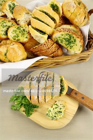 Fresh baked sliced herb and garlic rolls straight from the oven.