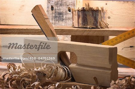 Carpenter's plane close-up, tools on a workbench