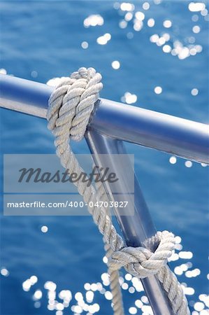 marine knot detail on stainless steel boat railing banister