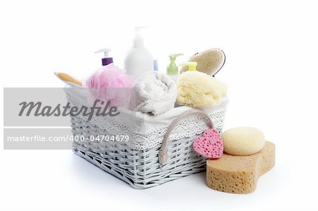 Toiletries stuff sponge gel shampoo and bath towels on white background