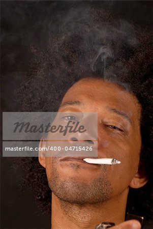 African american male after lighting a spliff