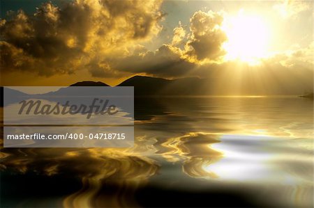 A yellow sunset over the calm sea