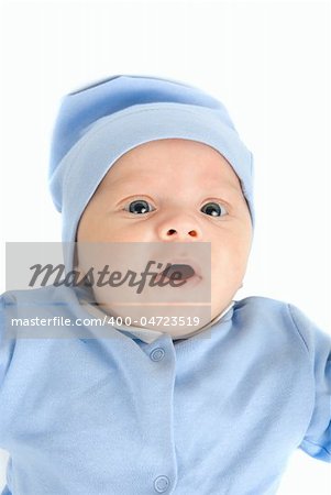 Lying baby boy at blue on a white background