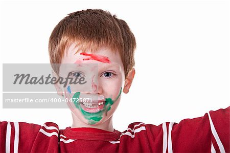 Children playing with paint, with painted face