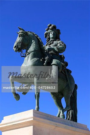 Louis XIV's statue in front of the Versailles Chateau