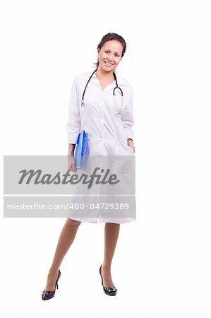 Smiling female doctor holding some folders. Isolated on white.