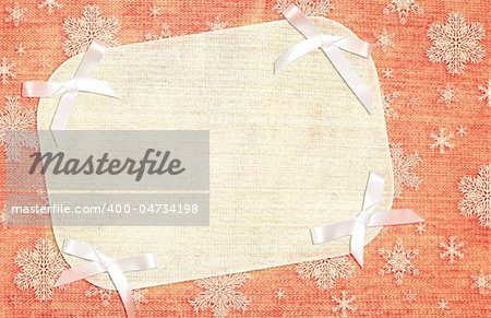 Christmas background with fabric texture and bows