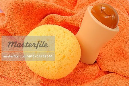 Bath items for shower on the orange towel