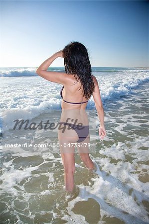 woman at beach of palmar in cadiz spain