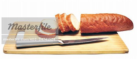 Baguette sliced with a knife isolated on white