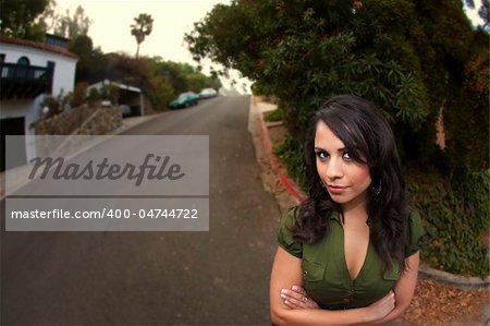 Fisheye Shot of Pretty Latina Woman Standing on Street Outdoors