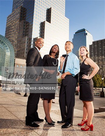 A group of successful busienss people looking up and to the side - concept image of success or dreams