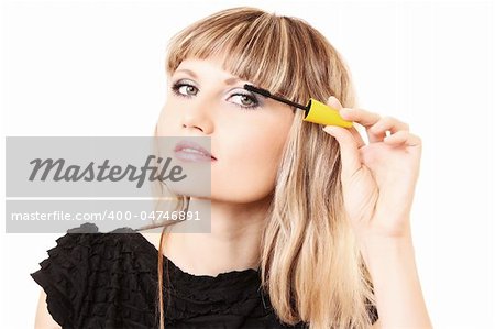 Young woman makeup with mascara isolated on white