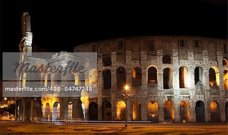 The Colosseum at night in Rome, Italy