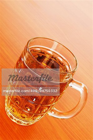 Beer glass on the wooden table