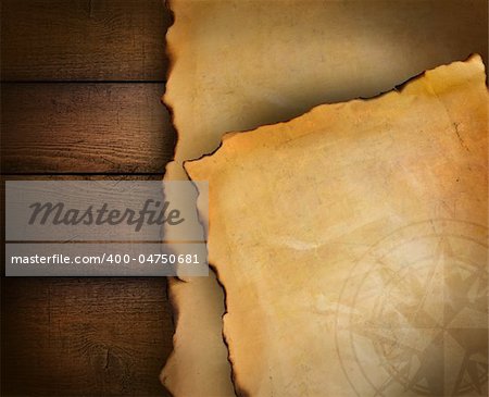 Closeup of parchment paper on wood background