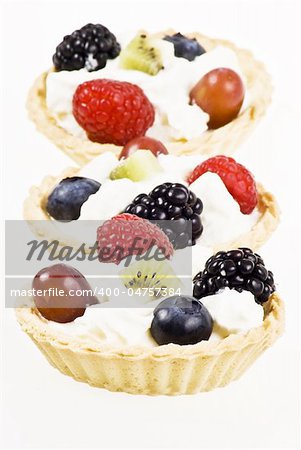 Cakes with fresh fruits and cream