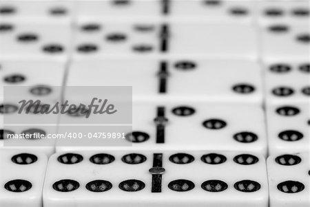 Full frame take of randomly positioned domino stones