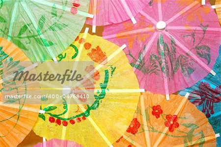 colorful cocktail umbrella texture for summer drinks