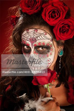 Sexy lady with red roses on Day of the Dead
