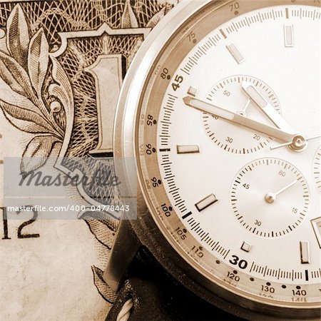 financial time concept with money and watch