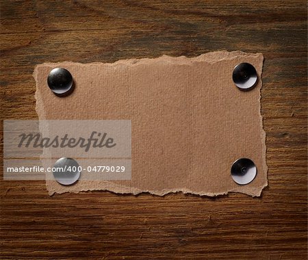 close up of grunge note paper on wooden background