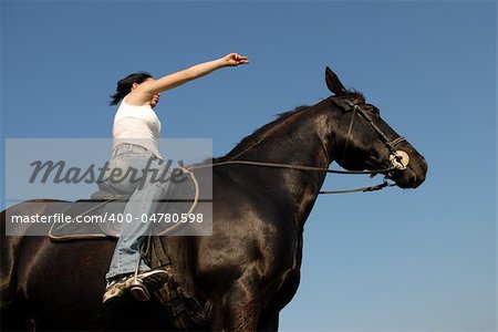 young teenager and her white black horse