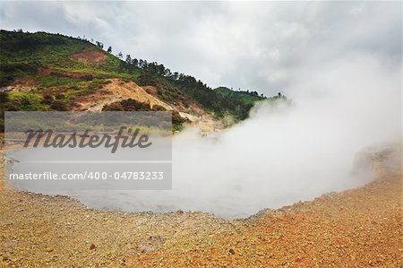 Mud crater Sikidang at plateau Dieng. Java