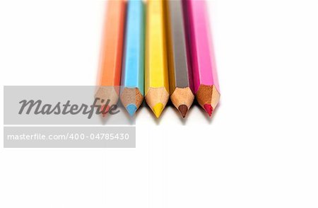 Five colored pencils on a white background