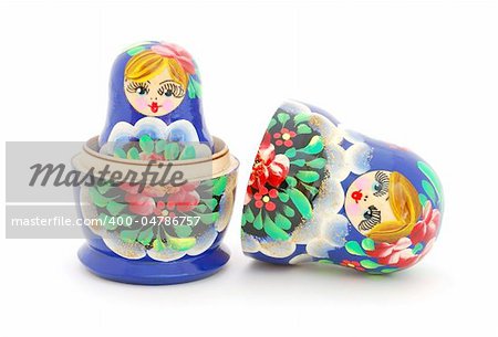 An opened Russian doll on white background