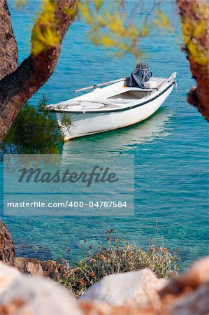 Small motor boat on the silent sea