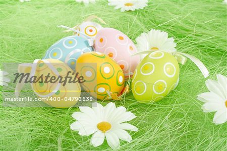 Painted Colorful Easter Eggs on green Grass