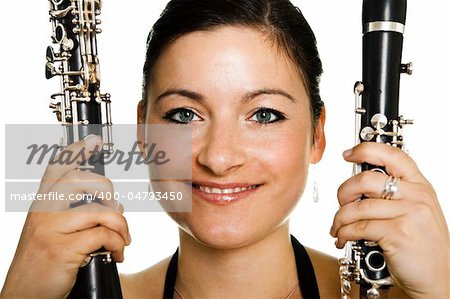 Cheerful clarinetist women. Close-up shot. Isolated on white
