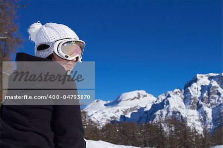 Portrait of female snowboarder wearing goggles