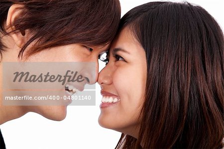 Young asian couple face to face and smiling