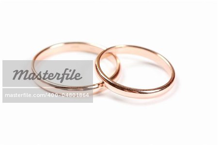 Two wedding rings isolated on a white background