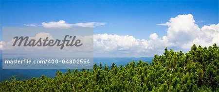 Mountains landscape with clouds and blue sky