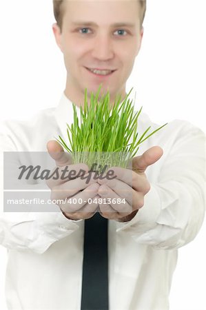 man holding a small plant in the studio isolated