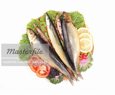 fish with lemon on plate isolated on white