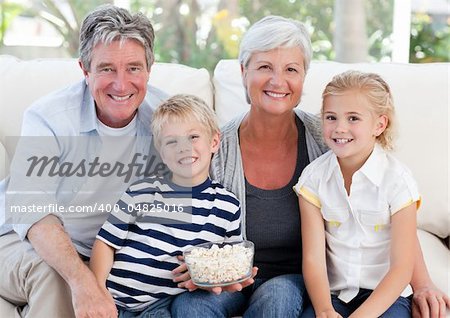 Lovely family watching tv