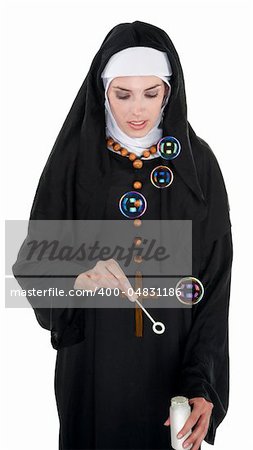 Nun dipping a wand in bubble container