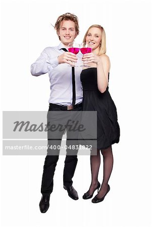 Young couple toasting with pink drink. Two people drinking. Studio photo, isolated.