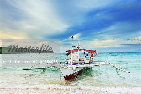 Traditional Philippine boat in the tropical lagoon