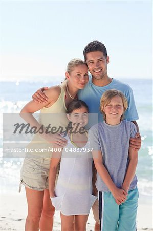 Joyful family at the beach